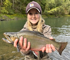 Megan Gray caught a record-setting brook trout while wade-fishing in the Little Red River in October 2023