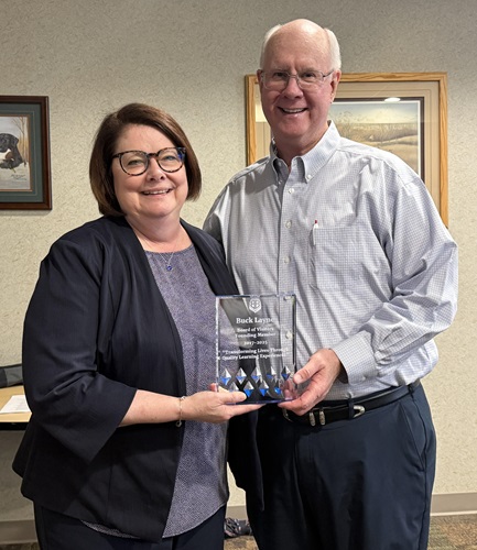 Dr. Jennifer Methvin (left), ASU-Beebe chancellor, presents a plaque to Buck Layne in honor of his service as a founding member of the ASU-Beebe Board of Visitors from 2017 to 2025.