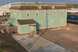 Fort Smith Officials Install New Siding at Miss Laura's Historic Landmark