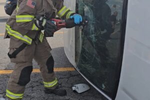 First Responders Enter Vehicle To Aid Occupant In Maumelle, Arkansas