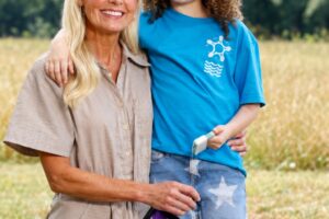 Woman and girl with a kite in an Arkansas field