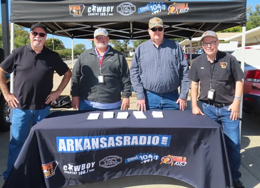Guests at the ArkansasRadio.com table during Foster Heating & Air Customer Appreciation Day 2026