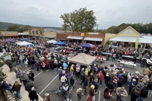 aLarge crowd fills downtown Mountain View Arkansas around the courthouse square during the 2026 Bean Fest