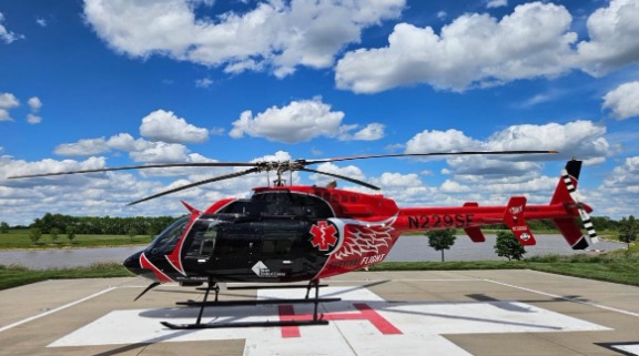 Survival Flight helicopter on a landing pad